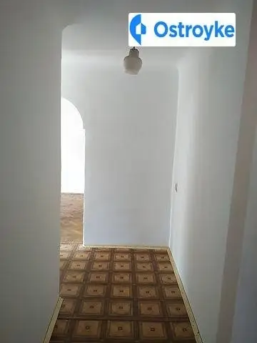 головна